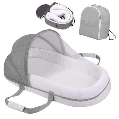 Faltbares & tragbares Babynest mit Moskitonetz – Schlafinsel Cosina