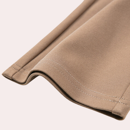 Kamelbrauner Stoff, Detailansicht, hochwertige Textur, Nähte, Mode, Bekleidungsmaterial.