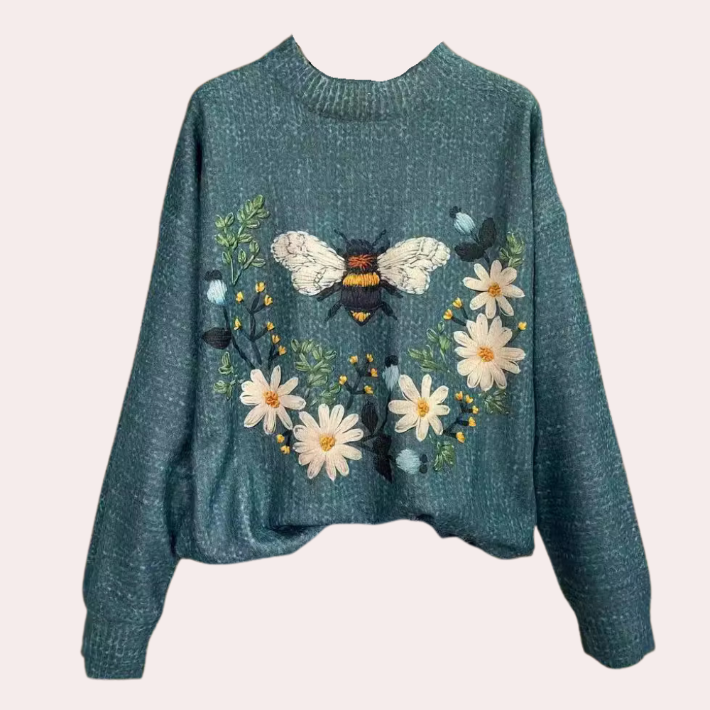Blauer Damenpullover mit Bienen- und Blumenstickerei, Strickmode, Herbstkollektion.