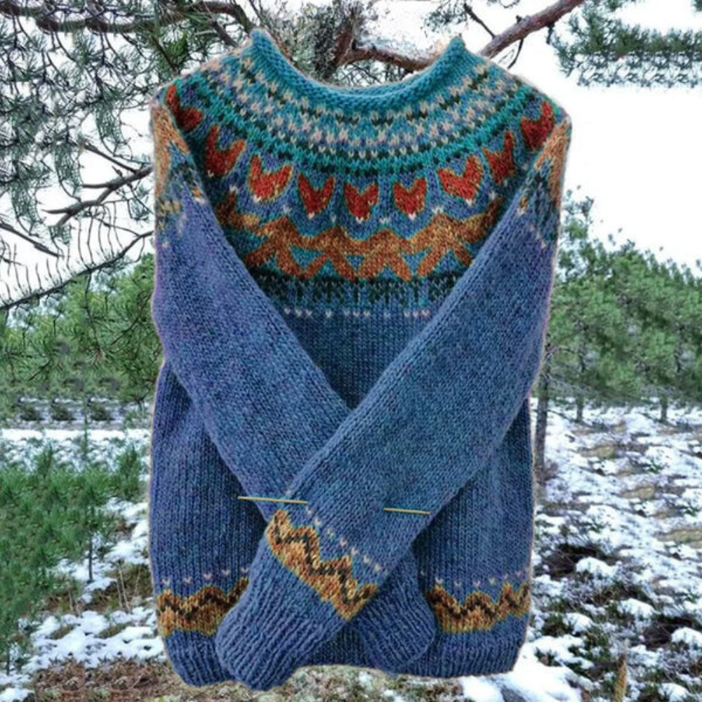 Blauer Strickpullover mit buntem Norwegermuster, Wintermode, Damenbekleidung, warm und stilvoll.