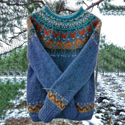 Blauer Strickpullover mit buntem Norwegermuster, Wintermode, Damenbekleidung, warm und stilvoll.