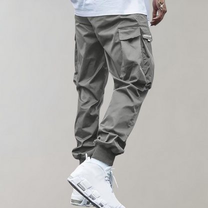Graue Cargohose für Herren, lässig, mit Taschen, aus Baumwolle, modisch, urbaner Stil.