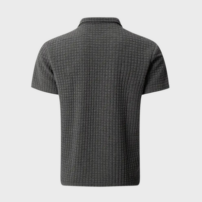 Graues Herren-Poloshirt aus Baumwolle, strukturierter Stoff, kurzärmelig, modisch.