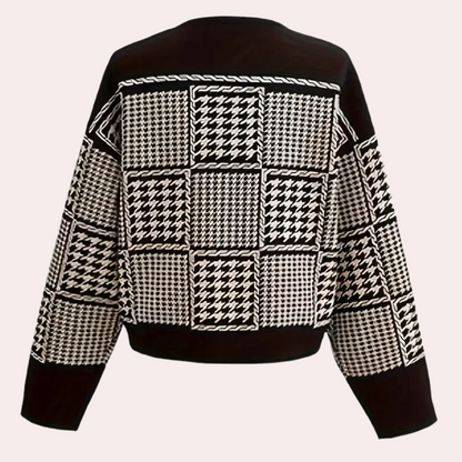 Schwarz-weißer Hahnentritt-Pullover, Damenmode, Strick, geometrisches Muster, Herbstkleidung.